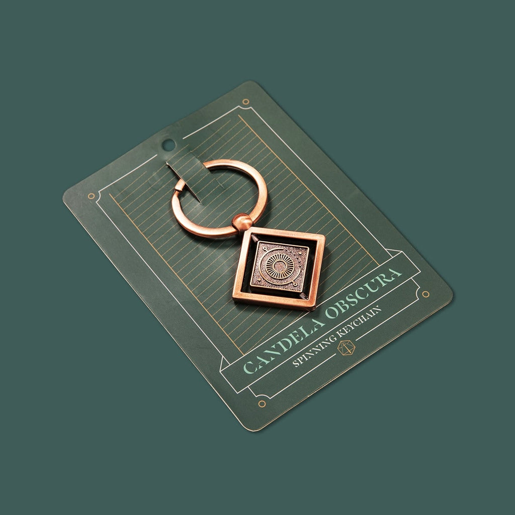 PREORDER Darrington Press - Candela Obscura Spinning Keychain