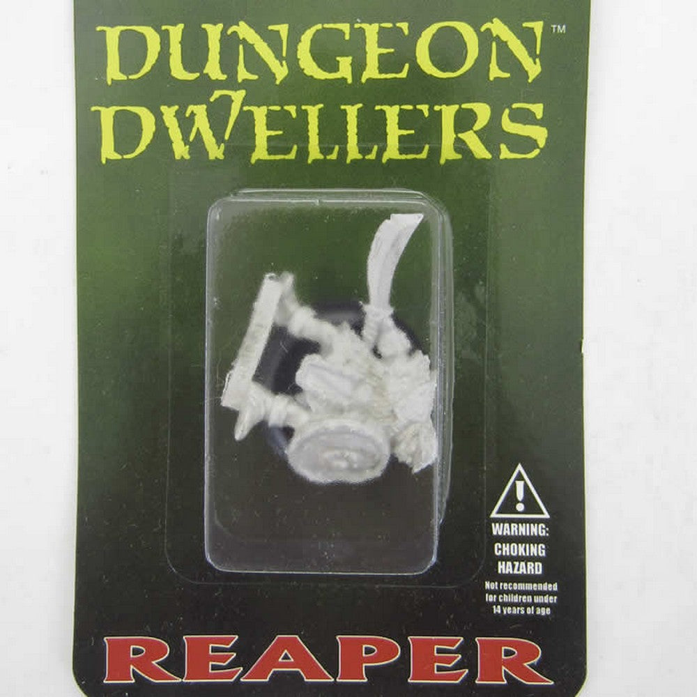PREORDER Reaper: Dungeon Dwellers: Orc Warrior of the Ragged Wound (Plastic)